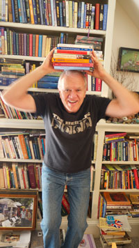 Steve holding non-fiction books